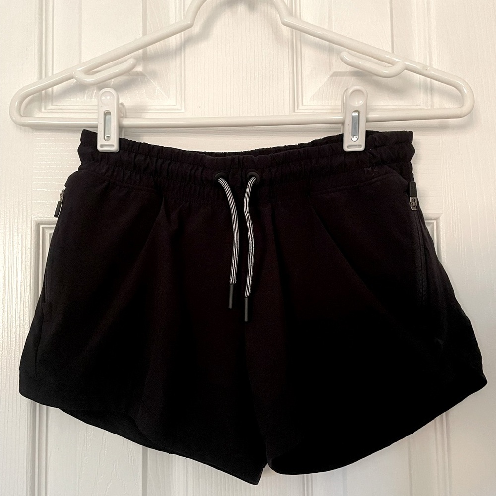 Athleta girl black shorts 
Size 10/12